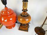 two lamps that are sitting next to each other on a table