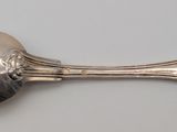 a spoon that is sitting on a table