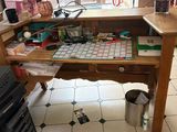 an image of a cluttered work station in a kitchen