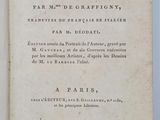 an open book with a black and white title on it