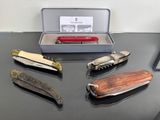 several different types of swiss army knives are on a table