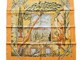 a picture of a yellow scarf with a picture of a forest