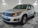 the volkswagen tiguan is parked on a checkered tile floor