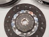 a close up of a clutch plate and a flywheel