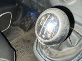 an image of a car ' s gear box with a gear stick