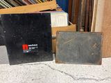 a lot of old records on the floor next to each other