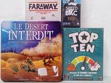 three children ' s board games sitting on top of a table