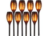 a set of five torches with orange lights on them