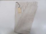 men ' s light grey pants with a tag on the side