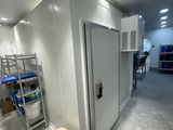an image of a room with a toilet and a shower