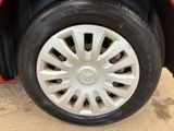 a close up of a tire on a red car