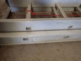 an image of a bed frame with two drawers