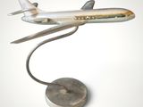 a model of an airplane that is on a stand