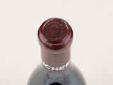 a bottle of wine that is sitting on a table
