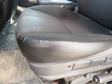 an image of a car seat with a dirty seat cover
