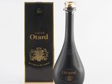 a bottle of ouard with a box on a white background