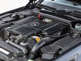 a car engine with the hood up and the hood down