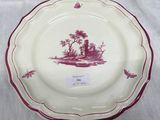 a plate that has a picture of a man and a woman on it