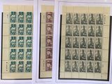 two pages of stamps with a picture of a man and a woman