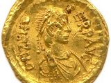 une pièce d'or portant l'image d'un homme