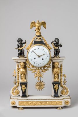 a clock that is sitting on top of a table