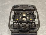 the inside of a car with the engine compartment removed and the battery in the back of the car