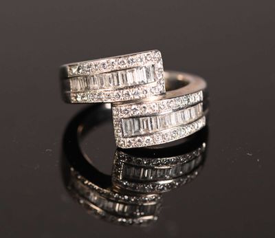 an image of a pair of diamond rings on a black surface