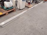 many different types of machines on a pallet in a parking lot