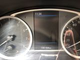 a close up of a car dashboard with a speedometer and gauges