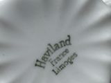 a close up of a plate with a logo on it