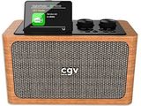 un gros plan d'une enceinte en bois sur laquelle est posé un téléphone portable