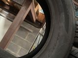 many tires stacked on top of each other in a warehouse