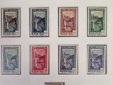 an image of a collection of stamps with different designs on them