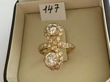 a ring in a box with a price tag on it