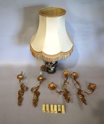 a lamp that is on a table with a lamp shade on it
