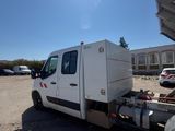 a white truck that is parked in a parking lot