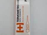 une image représentant un tube de dentifrice posé sur une surface blanche