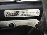 a close up of a car ' s engine with a sticker on it