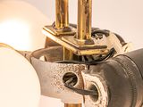 a close up of a lamp that has a light bulb attached to it