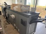 une image représentant une machine placée au milieu d'une pièce