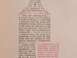 a bottle of wine on a table with a list of wines