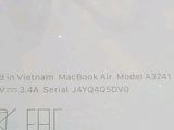 a close up of a business card with a picture of a plane