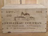 a wooden box with a picture of a chateau couran on it