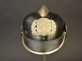 a helmet that has a coat of arms on it