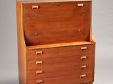 an image of a wooden chest with three drawers on it