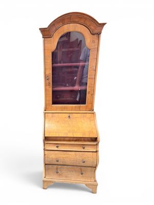 an image of a small wooden cabinet with a glass door