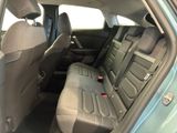 the back seats of a car are empty and the passenger seat is empty