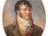 portrait of a man in a brown coat with a yellow striped tie