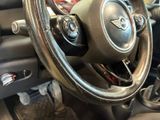 a close up of a steering wheel in a car