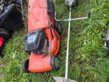 many lawn mowers and lawn mowers on the grass